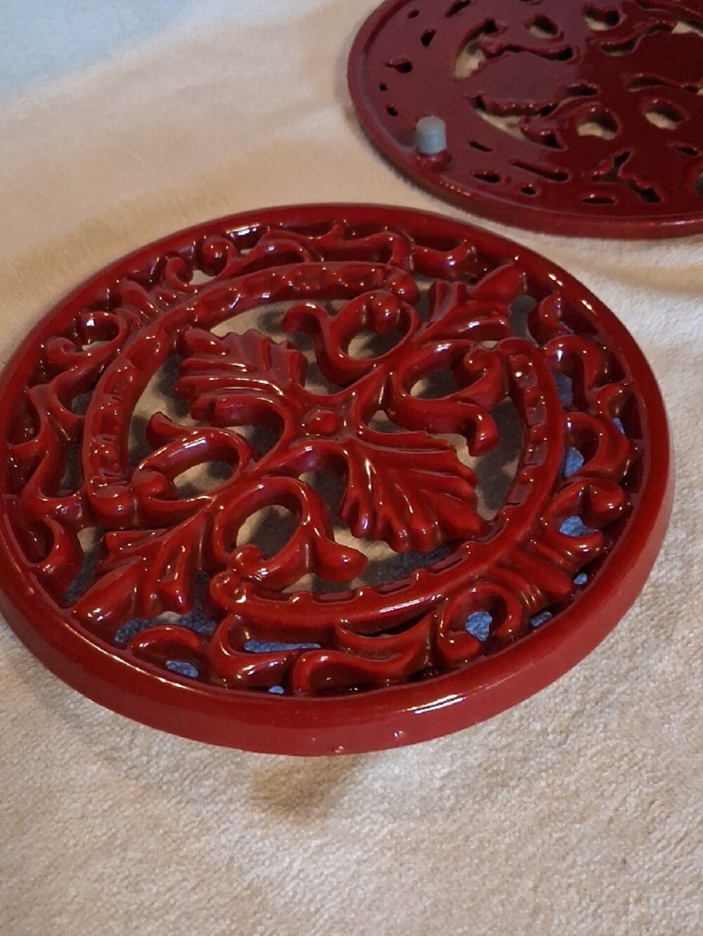 Staub Red Decorative Cast Iron Enameled Trivet Pair - Picture 4 of 5